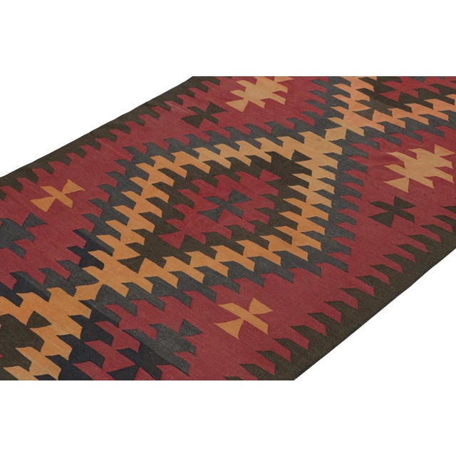 This vintage 5x14 Persian Kilim is handwoven in wool, and originates circa 1950-1960. Connoisseurs may also note that Rug...
