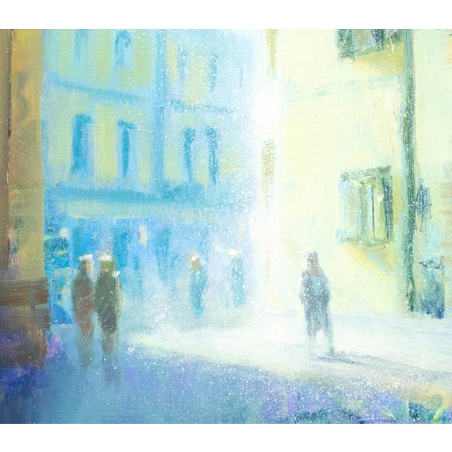 This artwork captures a sunlit street in Pistoia, where soft, hazy light bathes the buildings in warm tones. The interplay...