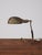 Beautiful brass Art Deco table lamp / desk lamp, France 1920s / 1930s. The shade is adjustable and has a lovely shell...