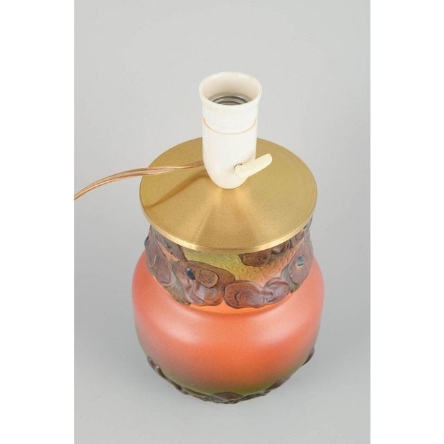 Ipsens Enke Table lamp, converted from ceramic vase, ca. 1920s/30s. Glazed ceramic lamp base with sculpted floral relief...