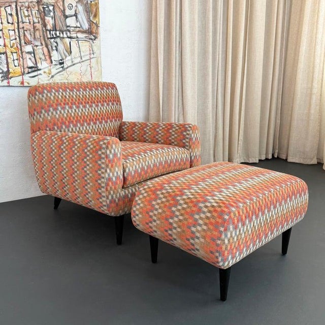 This mid 20th century lounge chair and ottoman set is dated from the 1940's. In format this follows the structure of a...