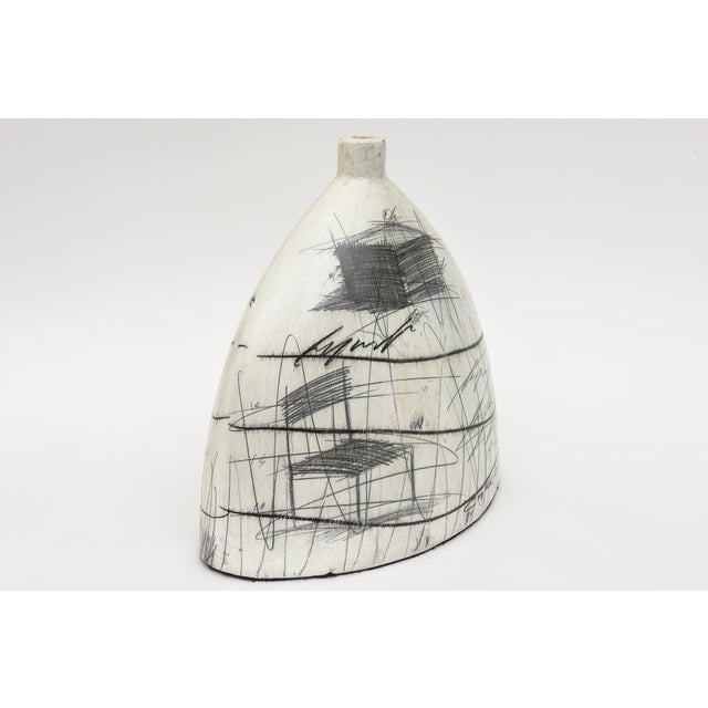 This signed contemporary fabulous highly sophisticated ceramic vessel and or sculptureis signed Yuri by the artist and...