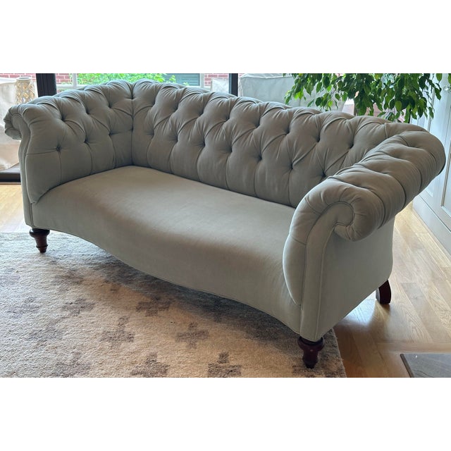 A classic Anthropologie Chesterfield sofa in a refined blue-green “Mist” upholstery, crafted by Vanguard Furniture in...