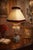An impressive table lamp, an authentic piece of vintage craftsmanship from the 1960s, characterized by timeless elegance....