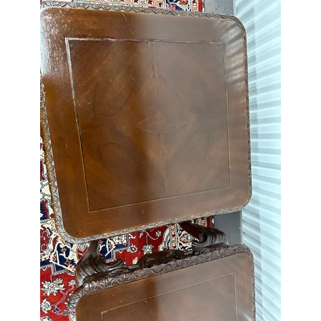 Exquisite Handcrafted End Tables: Elevate your living space with these beautifully matched carved hard wood end tables....