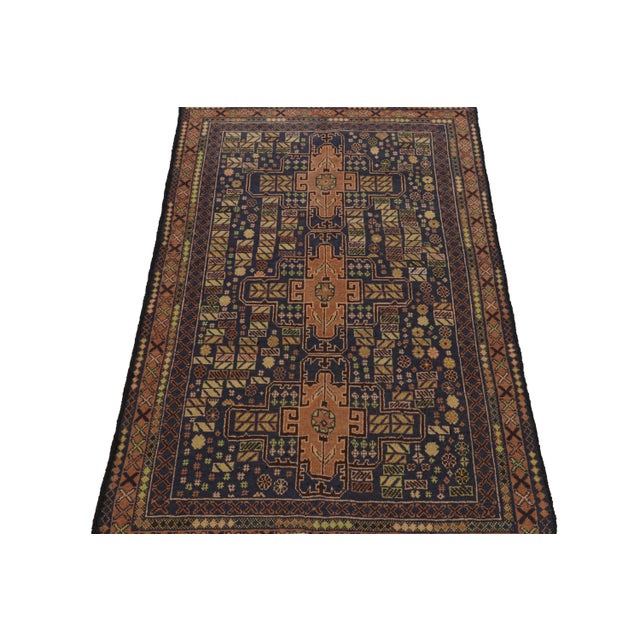 Hand knotted in wool and goat hair, this 4x6 Baluch rug represents a new line of tribal carpets in the Modern Classics...