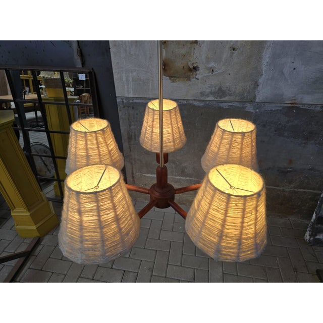 This very elegant designed ceiling light is made by the German Domus company during the 1970's. It's crafted out of solid...