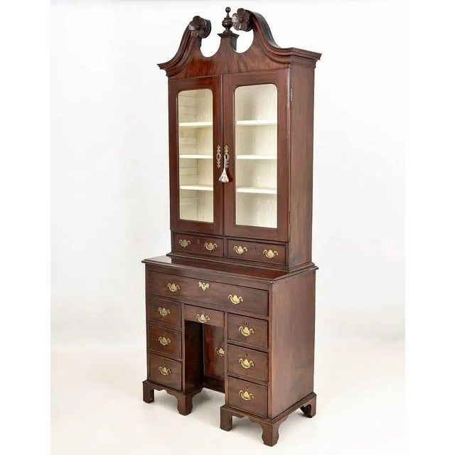 Mid-18th Century Irish Secretary Cabinet. Attributed to Christopher Hearn. Mahogany Kneehole Desk that pulls out to reveal...