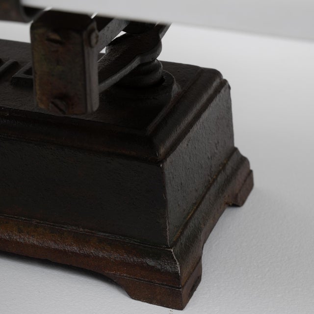 This 19th Century French iron and marble scale is a striking example of utilitarian craftsmanship elevated by elegant...