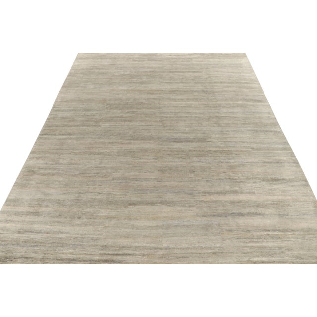 Rug & Kilim introduces its refined take on modern aesthetics with this smart, solid gray rug in a 12×15 rug from our...