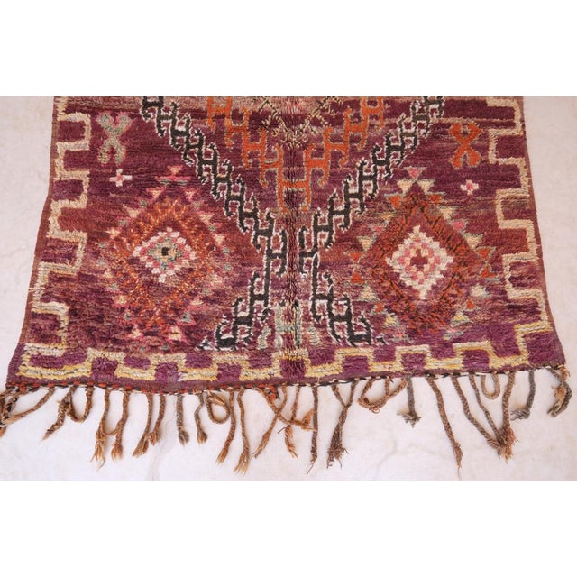 Introduce a rare piece to your home with our Moroccan Collector Boujaad Wool Rug. Measuring at 10.5 x 5.8 ft, this...