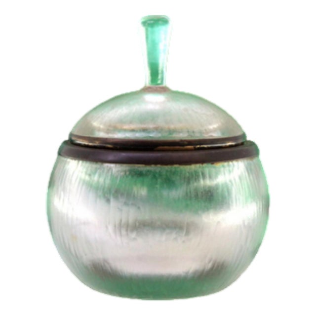 Flared Glass Bottle with Knob Lid and Silver Structure For Sale