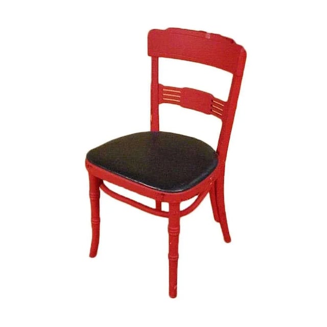 Red painted oak western side chair used in the 1952 film "Bus Stop" starring "Marilyn Monroe". These chairs be easily seen...