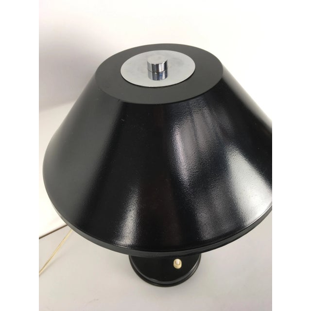 This vintage table lamp was designed by Jo Hammerborg for Fog & Mørup. It was produced in Denmark in the 1960s. European...