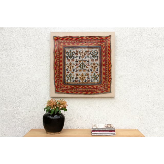 This mesmerizing 34-inch square textile panel is a genuine antique ritual cloth, likely originating from the highly...