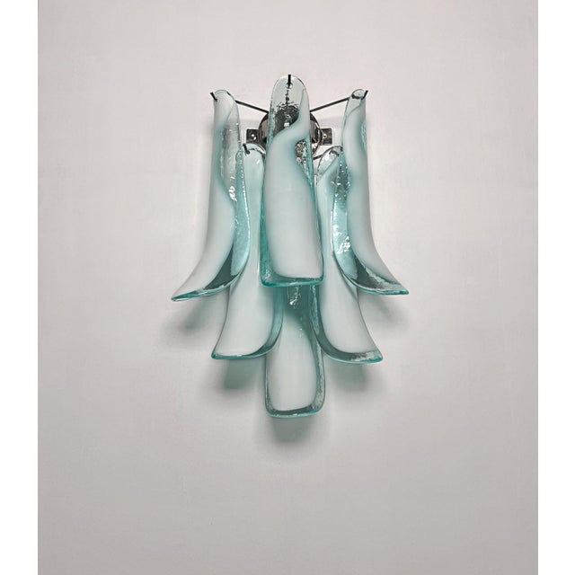 Pair of Vintage Italian Murano appliques. Wall lights have 6 turquoise and lattimo glass petals (for each applique) in a...