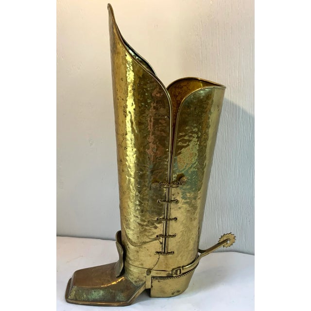 Love this western themed brass English boot shaped umbrella or cane stand!