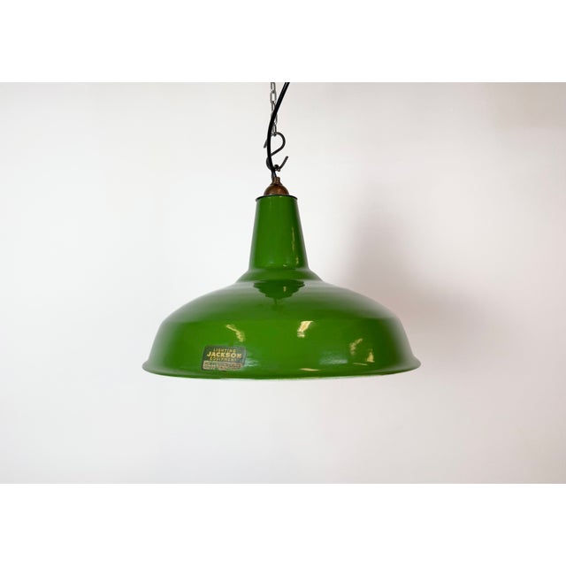 Industrial green enamel factory pendant light made by Jackson Electric Co. Chicago, Illinois in United States during the...
