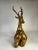 Gilt metal Moroccan deer statue. Whether it year round, this element creates a grand statement in any space.