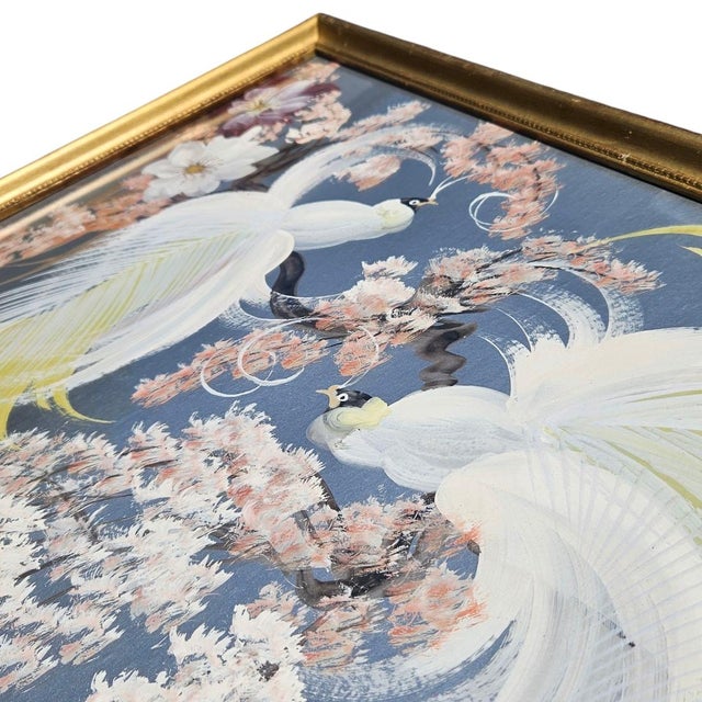 This rare mid‑century bird painting is rendered on a silver board, creating a luminous backdrop that enhances the vibrancy...