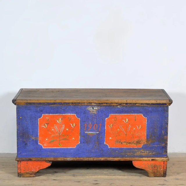 A pine wedding chest from 1901. The illustrations are traditional with images of flowers and tulips. The chest was part of...