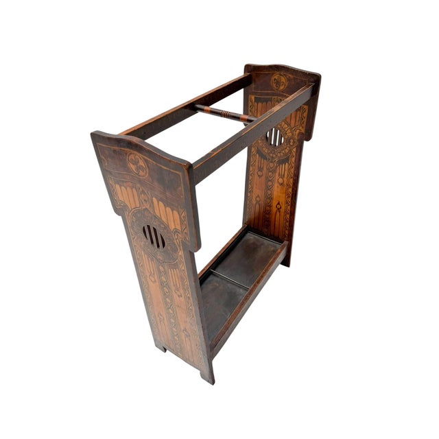 Magnificent and rare Aesthetic Movement umbrella stand Striking English design from the 1890s. Solid fruitwood frame with...