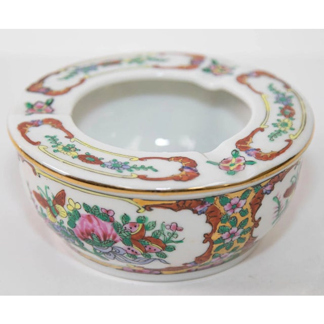 This vintage Asian porcelain hand painted floral ashtray was hand made in China. This gorgeous gilded ashtray is...