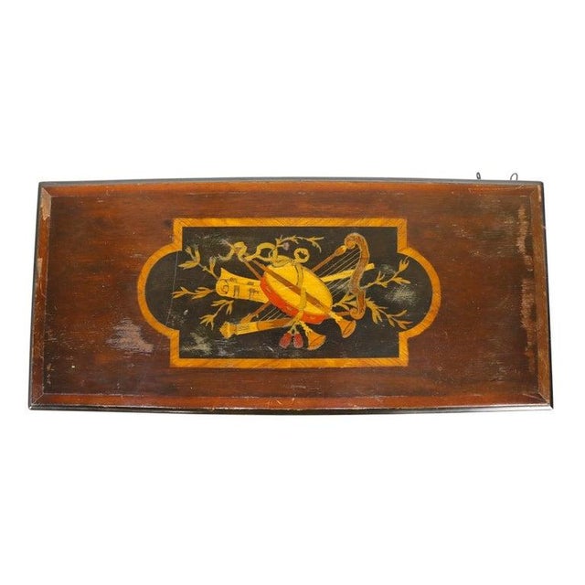 This antique Swiss cylinder music box, dating from approximately 1890, features a finely crafted rosewood case with...