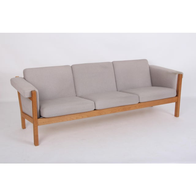 Vintage Sofa in Oak and Wool Fabric by Hans J. Wegner for Getama, 1970s, in Good conditions. Designed 1970 to 1979 This...