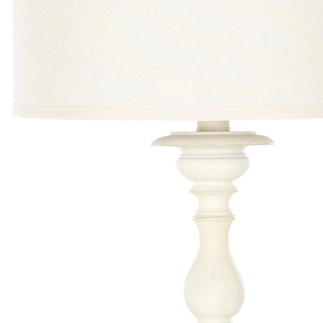 Adapted from a classic baluster design, Cream Candlestick Lamp brings just the right amount of French style to any room....