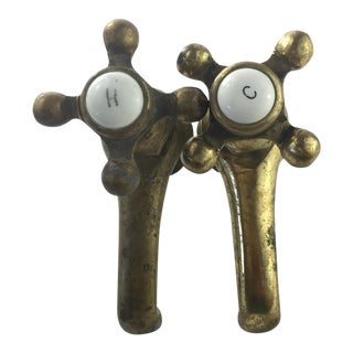 Brass Faucets Porcelain Buttons - A Pair For Sale