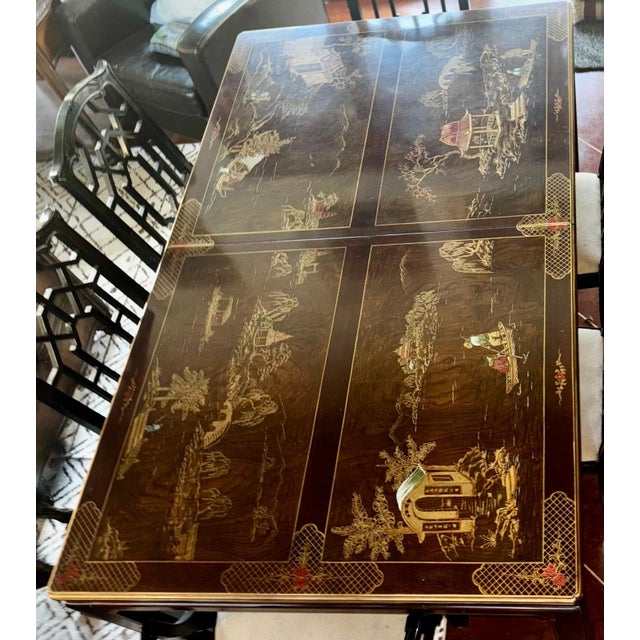 Henredon mahogany black lacquer Chinoiserie rectangular dining table. Table measures: 30" high x 42" deep x 70" wide. Hand...