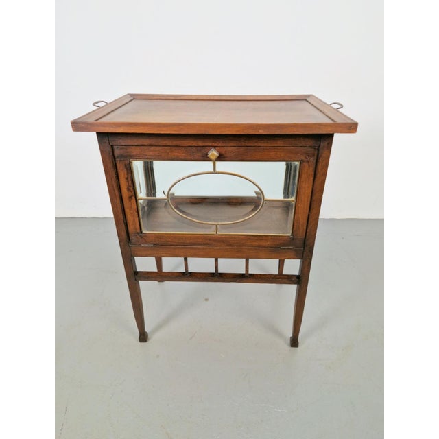 Vintage Tea Cabinet with Facet-Cut Diamonds and Four Doors Antique tea cabinet, display cabinet, or drinks cabinet with a...