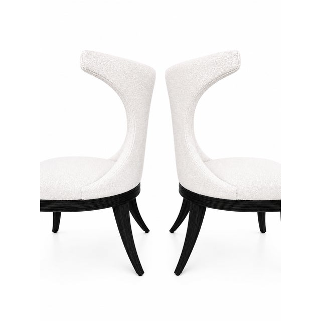Set of 10 RANDOLPH & HEIN dining chairs. The set has been restored. The finish is a dark zembrano finish. The fabric is a...
