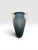 A striking signed studio art glass vase by acclaimed contemporary glass artist Steven Newell. This hand-blown vessel...