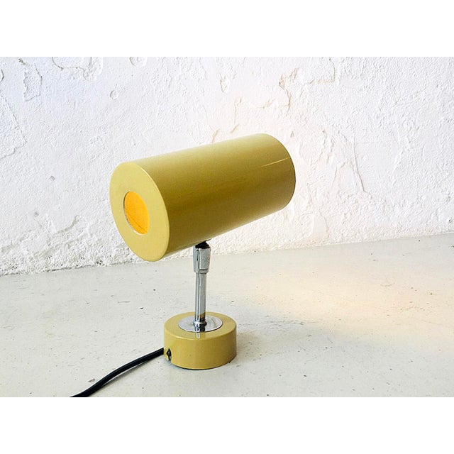 Adjustable Mustard Metal Spotlight, 1970s, in Flawless conditions. Designed 1970 to 1979 European Plug (up to 250V).The...