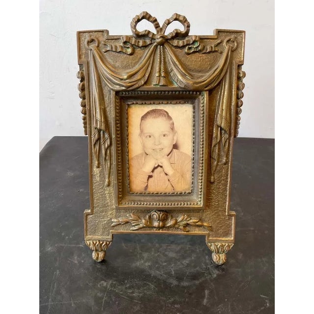 Pair of 1940s French classical bronze frames. Nice weight to these! Opening is 3.25” x 4.75”