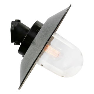 Vintage Industrial Grey Enamel Bakelite and Clear Glass Wall Sconce For Sale