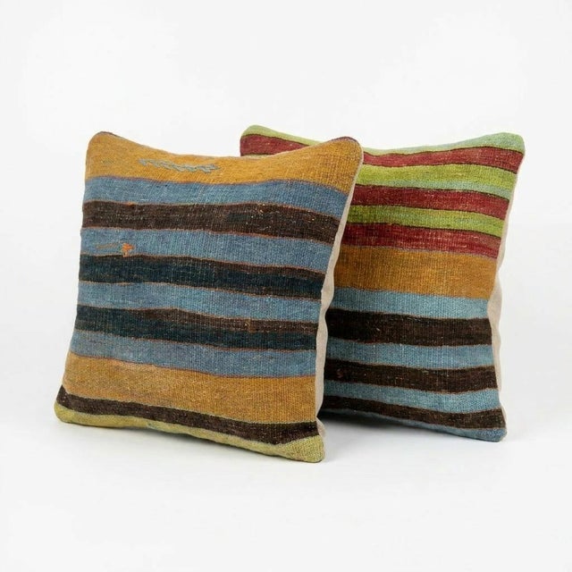This beautiful 20'' x 20'' pillow cover set was made from authentic Turkish rug pieces. Bright colors of wool adorn the...