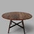 A 1950s Ercol oval drop-leaf dining table with a solid elm top and beech underframe. Two independent leaves transform it...
