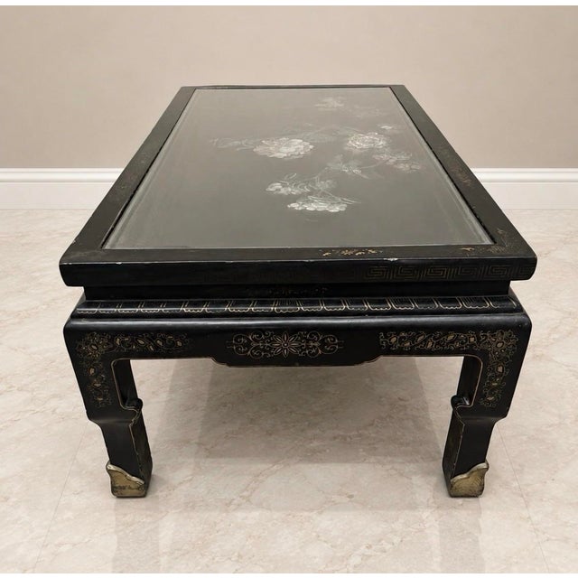 Hollywood Regency influenced vintage Asian-inspired black lacquer coffee table - circa 1960s–1980 Hollywood Regency...