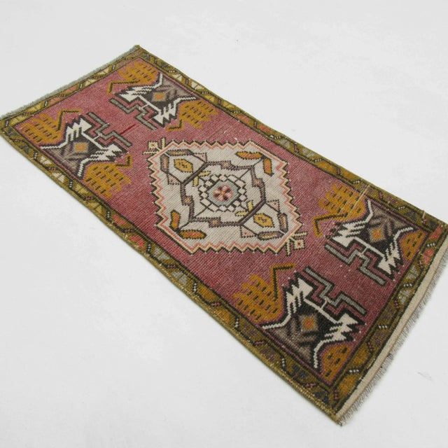 Vintage handknotted decorative mini rug from Konya region of Turkey. Approximately 50-60 years old. In very good condition.