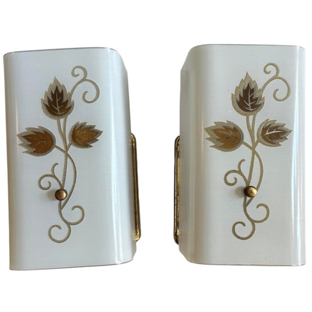 These are so great! The beautiful painted shades iver white and clear rimmed glass… simple brass plated box holders.