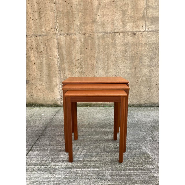 British Midcentury Nesting Tables in Teak by McIntosh This is a beautiful mid-century set of three coffee tables by A.H...