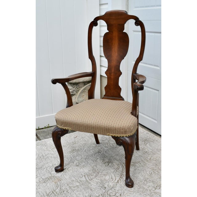 Vintage (1960's) Arm Chair has a Queen Anne Style . The Wood Frame is Walnut. Cabriole Legs, Brass Studs, and a Patterned...