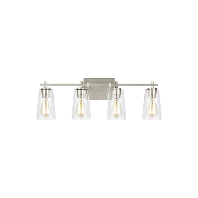 The Sean Lavin Mercer four light vanity fixture in satin nickel provides abundant light for your bath vanity, while adding...