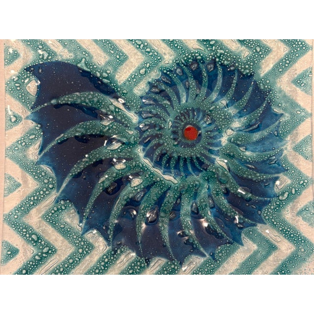 This coastal themed art glass bowl is the perfect piece to pay homage to the sea, whether at home or at the beach. The...