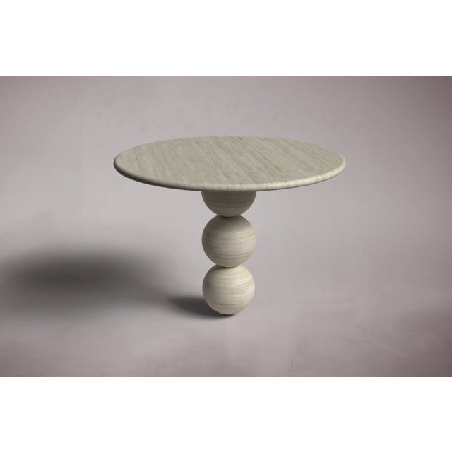 Crafted and hand-finished from Travertine. Travertine can be honed and polished for a matte finish that enhances the...