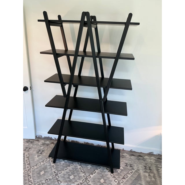 Bookcase " Nuvola Rossa" by Vico Magistretti Designed in 1977, Nuvola Rossa is a timeless icon featuring unexpected...
