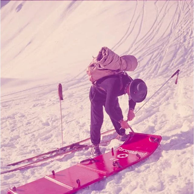 Mountain Top 1951 A member of the Klosters ski patrol checks a stretcher, Switzerland, 1951. Toni Frissell Antoinette...